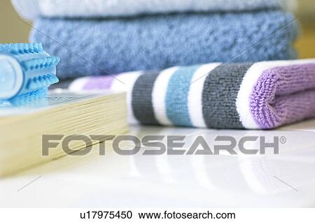 Book, towels, and a massaging tool View Large Photo Image Stock Image - Book, towels, and a massaging tool. Fotosearch