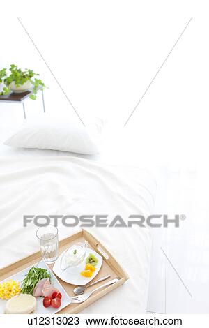 Breakfast on a bed View Large Photo Image Stock Image - Breakfast on a bed. Fotosearch