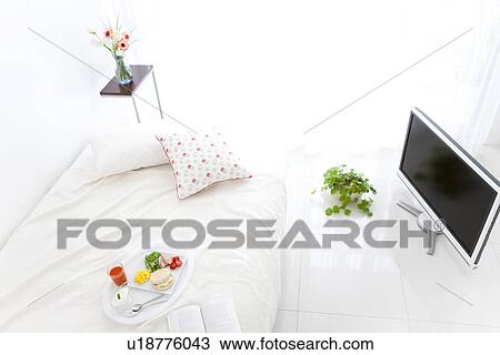 Stock Image - Breakfast on a bed. Fotosearch