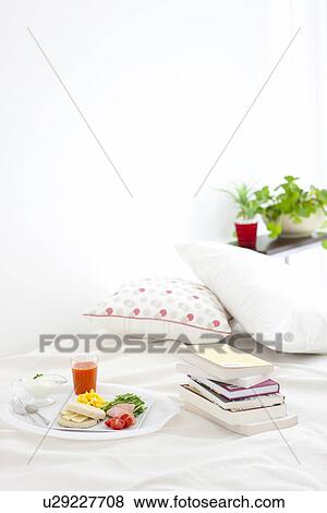 Breakfast on a bed View Large Photo Image Stock Photo - Breakfast on a bed. Fotosearch