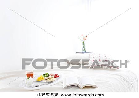 Breakfast on a bed View Large Photo Image Stock Photograph - Breakfast on a bed. Fotosearch