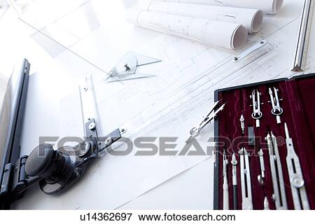 Stock Photo - Building plan drawing equipment. Fotosearch