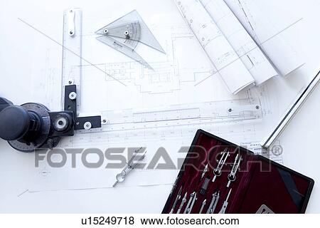 Stock Photo - Building plan drawing equipment. Fotosearch