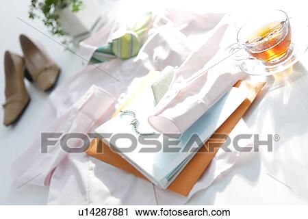 Stock Image - Business clothing and paperwork. Fotosearch