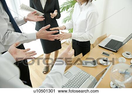 Business colleagues arguing in office View Large Photo Image Stock Image - Business colleagues arguing in office. Fotosearch