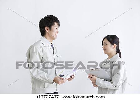 Business colleagues having conversation View Large Photo Image Stock Photo - Business colleagues having conversation. Fotosearch