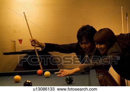 Business colleagues playing pool View Large Photo Image Stock Image - Business colleagues playing pool. Fotosearch