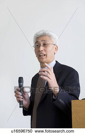 Businessman giving a presentation View Large Photo Image Stock Image - Businessman giving a presentation. Fotosearch