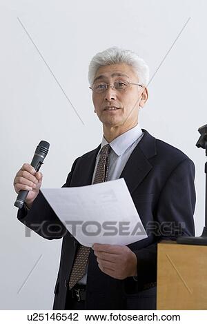 Businessman giving a presentation View Large Photo Image Stock Image - Businessman giving a presentation. Fotosearch