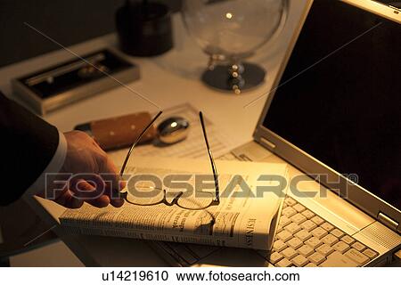 Businessman holding glasses View Large Photo Image Stock Image - Businessman holding glasses. Fotosearch
