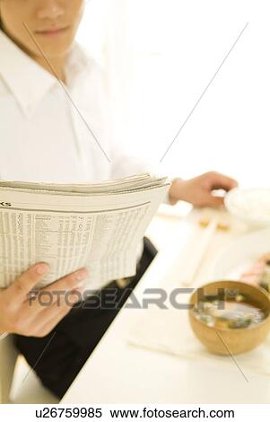 Businessman sitting eating breakfast View Large Photo Image Stock Photography - Businessman sitting eating breakfast. Fotosearch