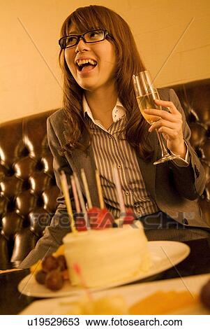 Businesswoman drinking champagne View Large Photo Image Stock Image - Businesswoman drinking champagne. Fotosearch