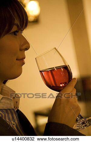 Businesswoman drinking wine View Large Photo Image Stock Image - Businesswoman drinking wine. Fotosearch