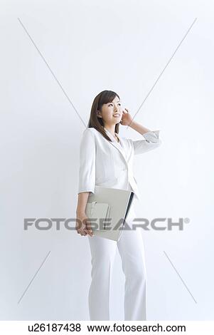 Businesswoman holding files View Large Photo Image Stock Photo - Businesswoman holding files. Fotosearch