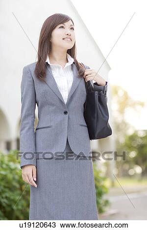Businesswoman in grey suit View Large Photo Image Stock Image - Businesswoman in grey suit. Fotosearch