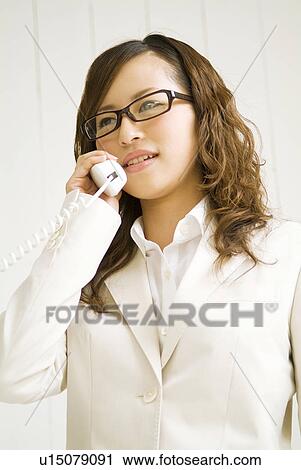 Businesswoman on the phone View Large Photo Image Stock Image - Businesswoman on the phone. Fotosearch