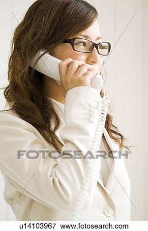 Stock Photo - Businesswoman on the phone. Fotosearch