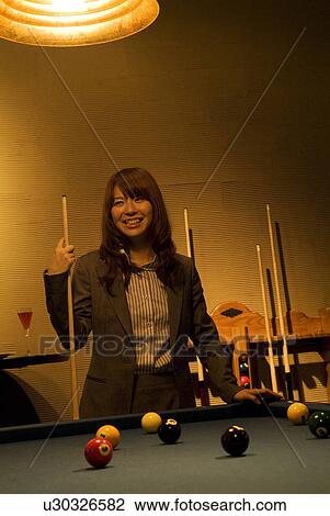 Businesswoman playing pool View Large Photo Image Stock Image - Businesswoman playing pool. Fotosearch