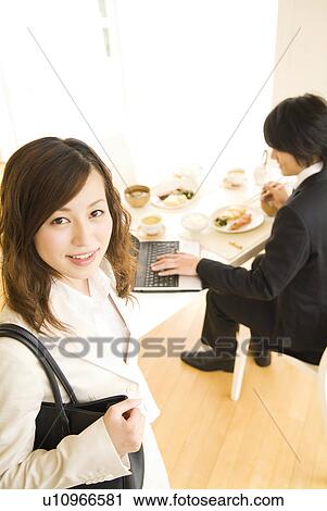 Businesswoman ready to leave home View Large Photo Image Stock Image - Businesswoman ready to leave home. Fotosearch