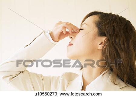 Businesswoman with headache View Large Photo Image Stock Photo - Businesswoman with headache. Fotosearch