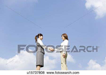 Businesswomen shaking hands View Large Photo Image Stock Photo - Businesswomen shaking hands. Fotosearch