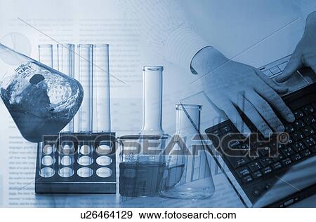 Chemistry equipment and scientist on laptop View Large Photo Image Stock Photo - Chemistry equipment and scientist on laptop. Fotosearch