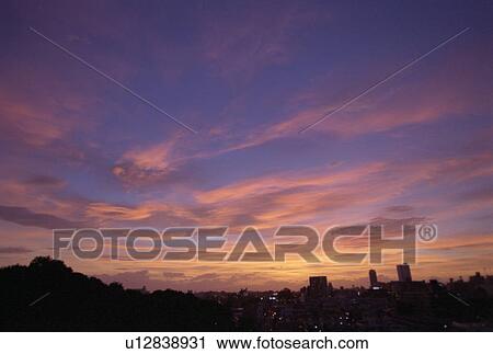 Stock Image - Cityscape at dusk. Fotosearch