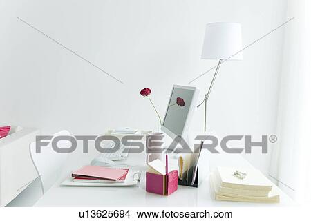 Computer desk with coffee cups and office stationery View Large Photo Image Picture - Computer desk with coffee cups and office stationery. Fotosearch