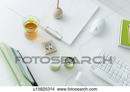 Computer desk with office stationery View Large Photo Image Picture - Computer desk with office stationery. Fotosearch