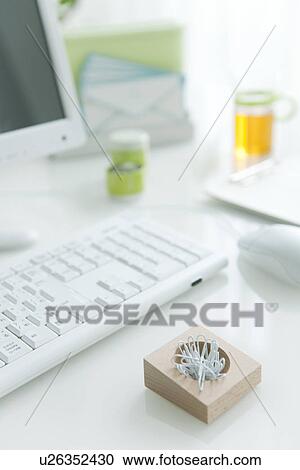 Computer desk with office stationery View Large Photo Image Stock Image - Computer desk with office stationery. Fotosearch