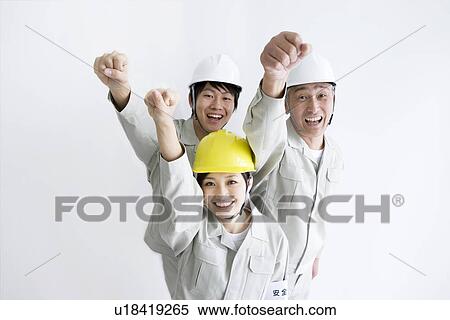 Construction workers cheering View Large Photo Image Stock Photography - Construction workers cheering. Fotosearch