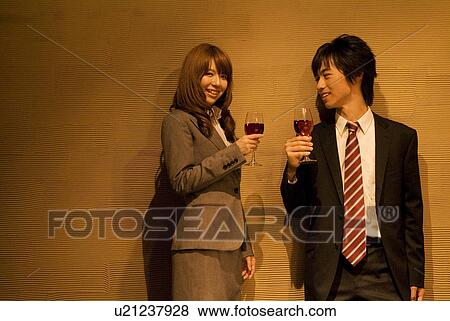 Couple drinking wine together View Large Photo Image Stock Photo - Couple drinking wine together. Fotosearch