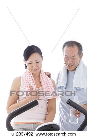 Couple working out together View Large Photo Image Stock Image - Couple working out together. Fotosearch