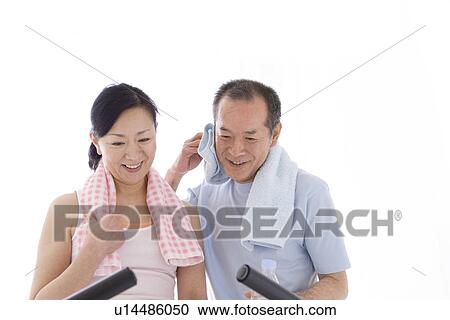 Couple working out together View Large Photo Image Stock Image - Couple working out together. Fotosearch