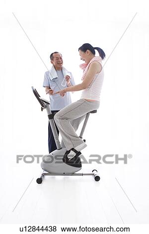 Couple working out together View Large Photo Image Stock Photo - Couple working out together. Fotosearch