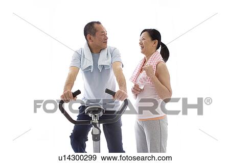 Stock Photo - Couple working out together. Fotosearch