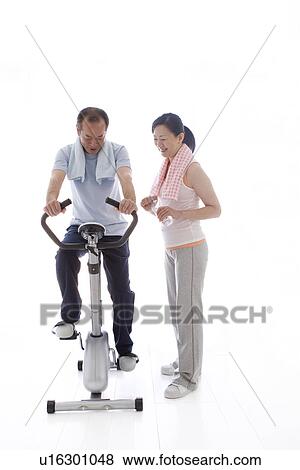 Stock Photo - Couple working out together. Fotosearch