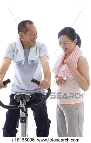 Stock Photograph - Couple working out together. Fotosearch
