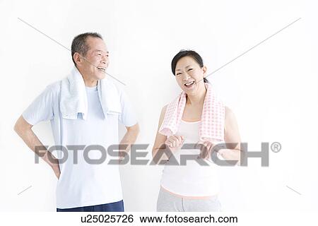 Couple working out together View Large Photo Image Stock Photograph - Couple working out together. Fotosearch