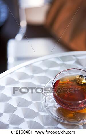 Stock Image - Cup of tea on a table. Fotosearch