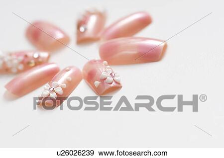 Stock Photo - Decorated false nails. Fotosearch