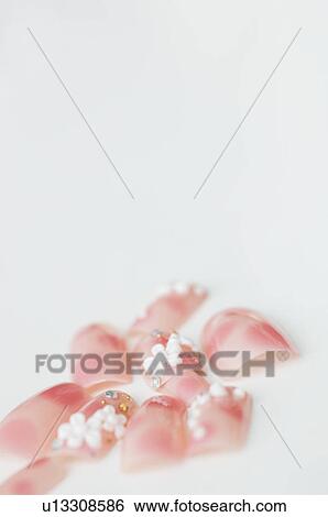 Decorated false nails View Large Photo Image Stock Photograph - Decorated false nails. Fotosearch