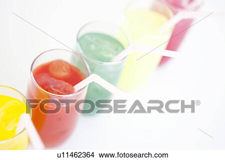 Picture - Different flavours of juice in a row. Fotosearch
