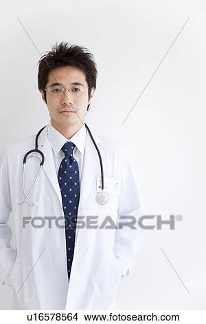 Picture - Doctor wearing stethoscope. Fotosearch