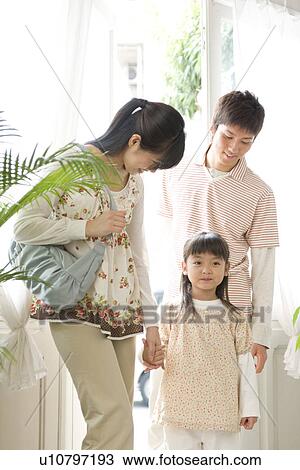 Family entering store View Large Photo Image Stock Image - Family entering store. Fotosearch