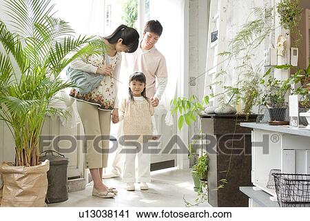 Family entering store View Large Photo Image Stock Image - Family entering store. Fotosearch