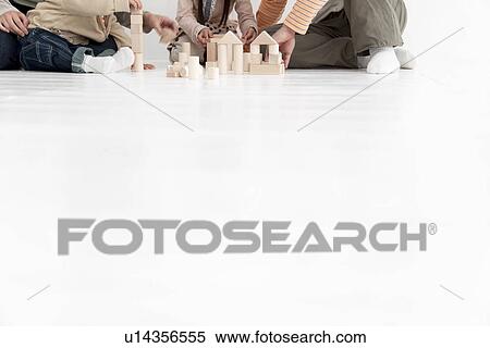 Family playing with toy blocks View Large Photo Image Stock Photography - Family playing with toy blocks. Fotosearch