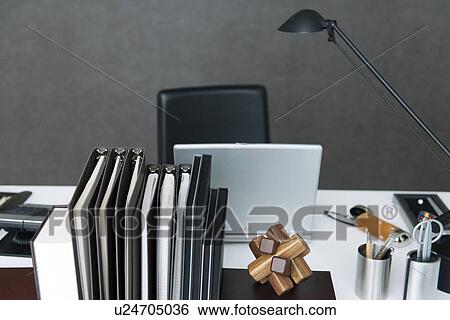 Files and book on office desk View Large Photo Image Stock Photograph - Files and book on office desk. Fotosearch