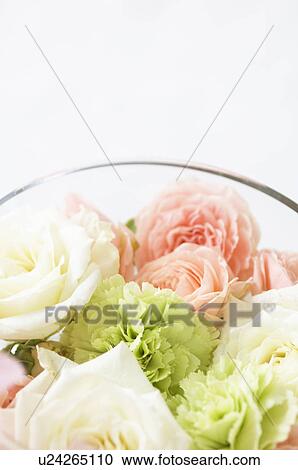 Flowers in a glass bowl View Large Photo Image Stock Image - Flowers in a glass bowl. Fotosearch