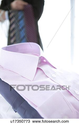 Stock Image - Folded shirts. Fotosearch
